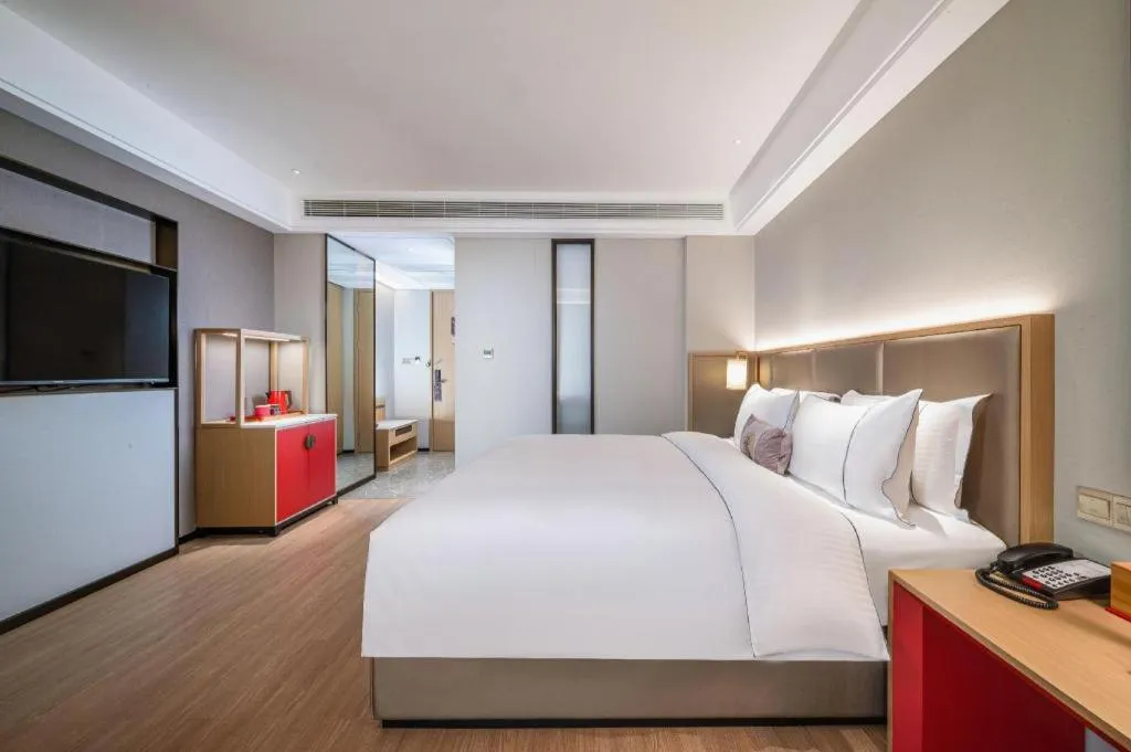 Bed in Echeng Hotel Hezhou Shizheng Square