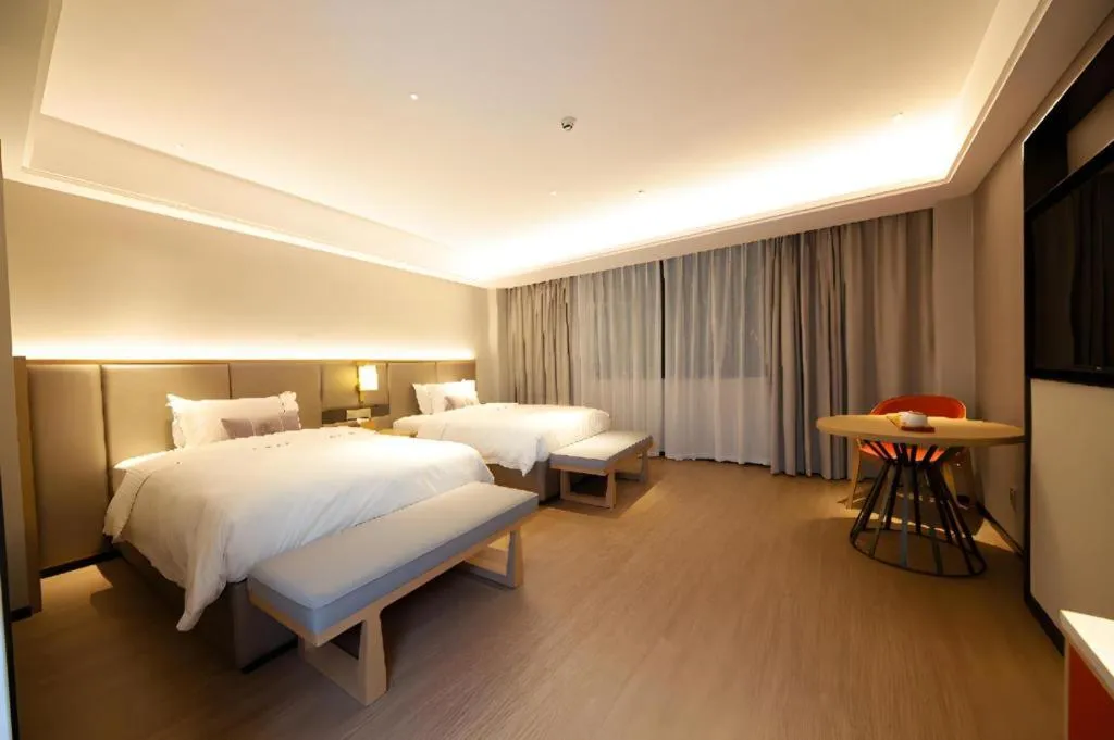 Bed in Echeng Hotel Hezhou Shizheng Square