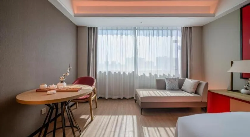 Bed in Echeng Hotel Hezhou Shizheng Square