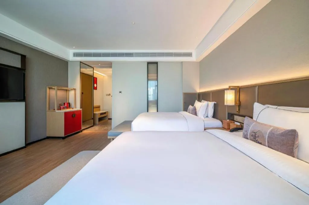 Bed in Echeng Hotel Hezhou Shizheng Square