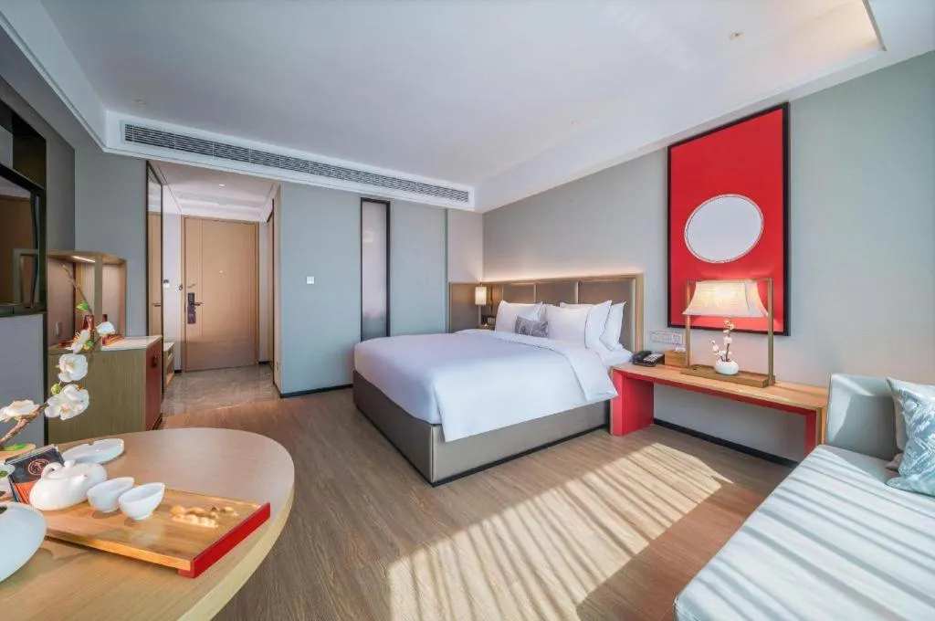 Bed in Echeng Hotel Hezhou Shizheng Square