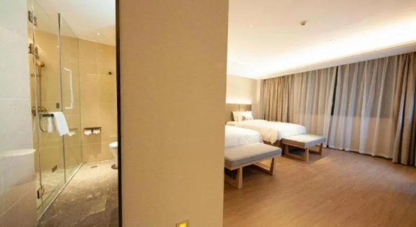 Bed in Echeng Hotel Hezhou Shizheng Square