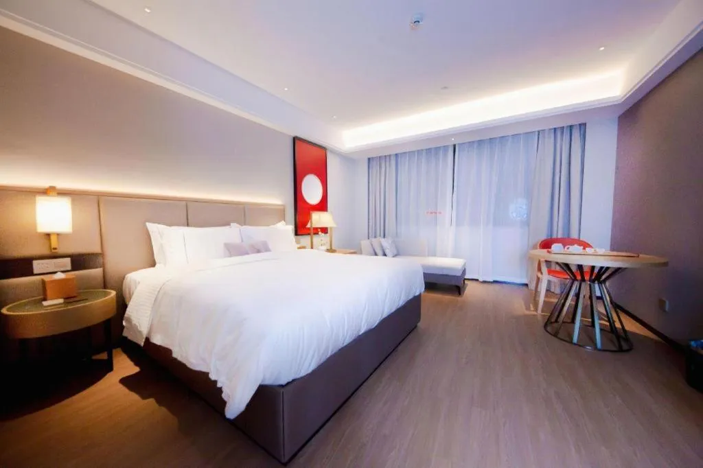 Bed in Echeng Hotel Hezhou Shizheng Square