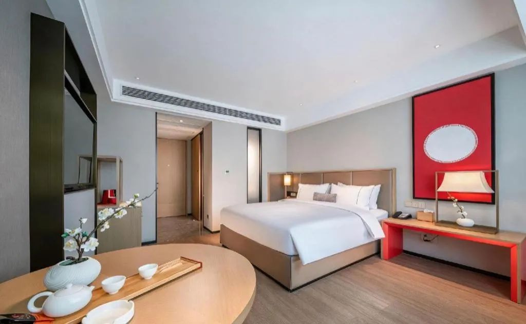 Bed in Echeng Hotel Hezhou Shizheng Square