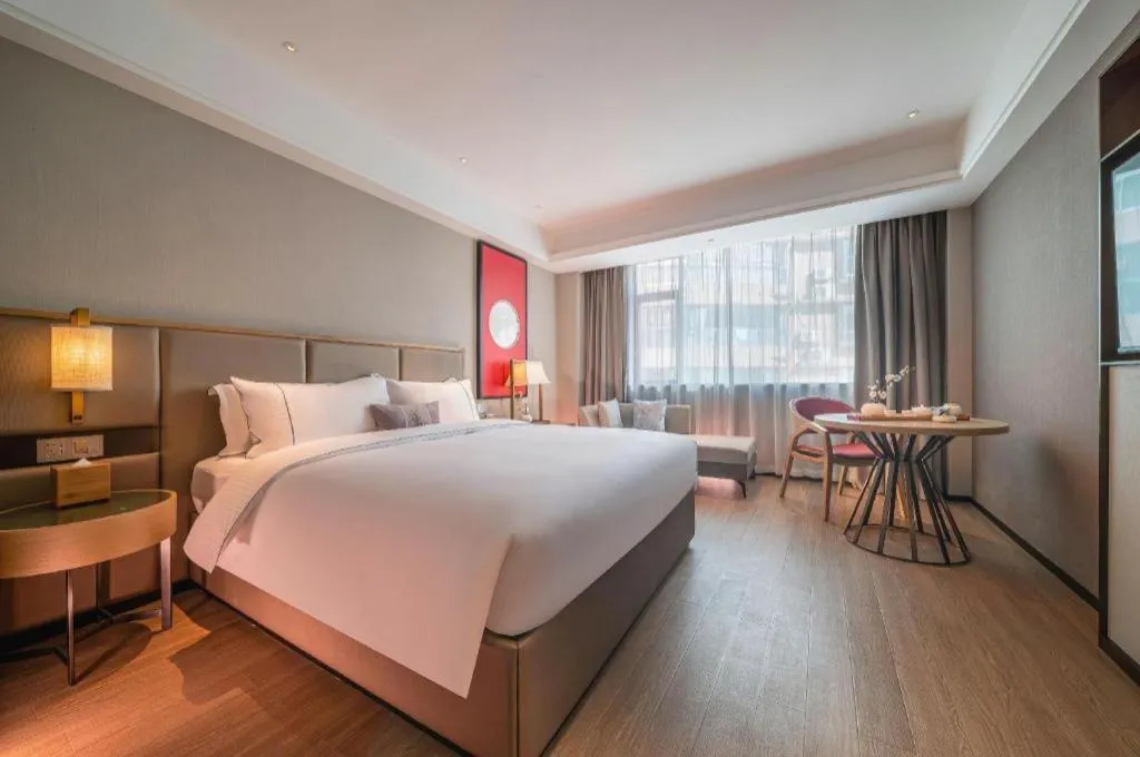 Bed in Echeng Hotel Hezhou Shizheng Square