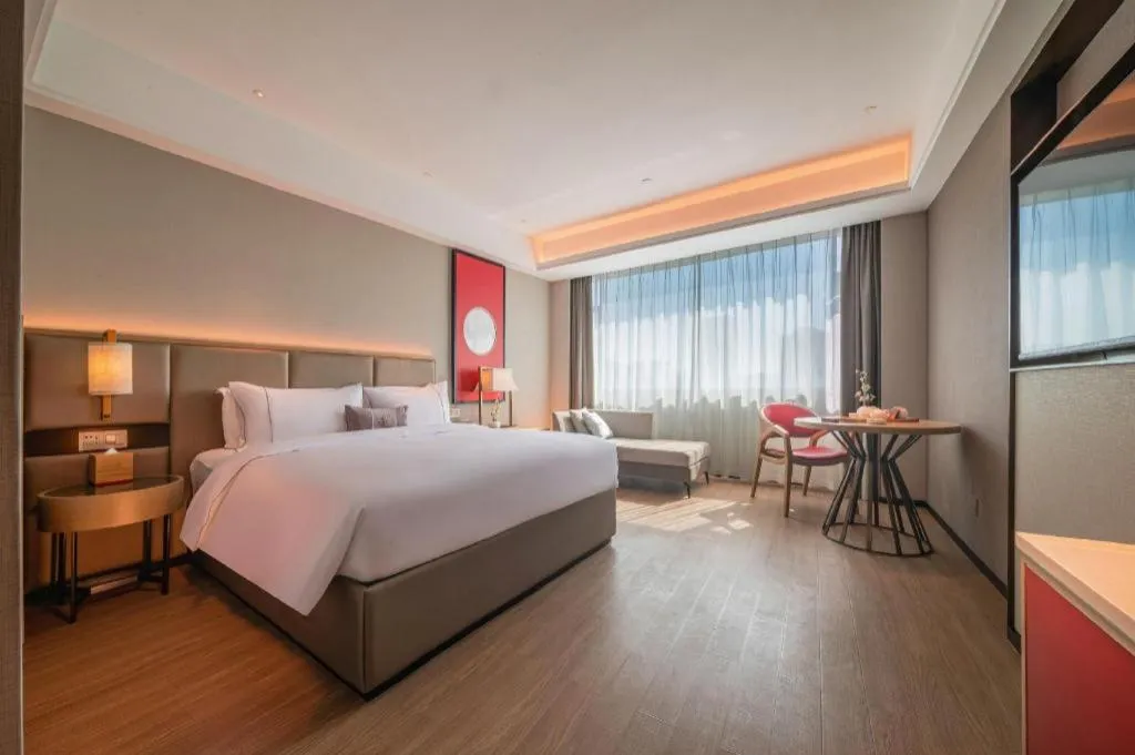 Bed in Echeng Hotel Hezhou Shizheng Square