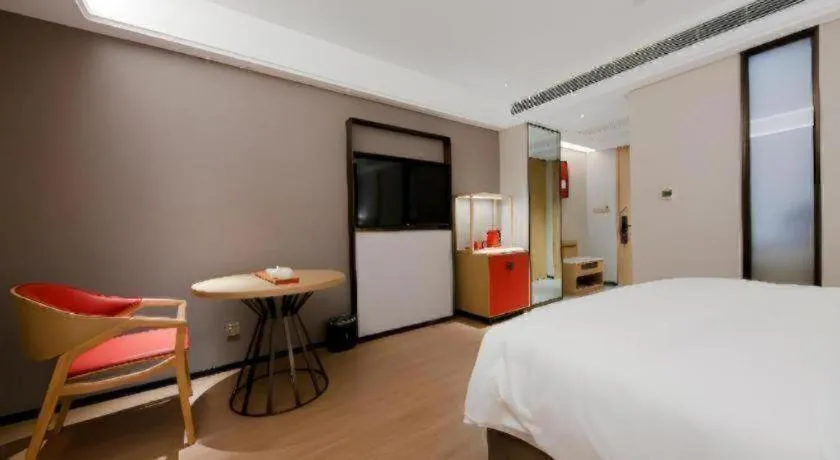 Bed in Echeng Hotel Hezhou Shizheng Square