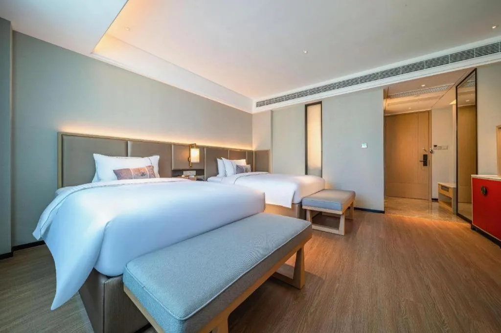 Bed in Echeng Hotel Hezhou Shizheng Square