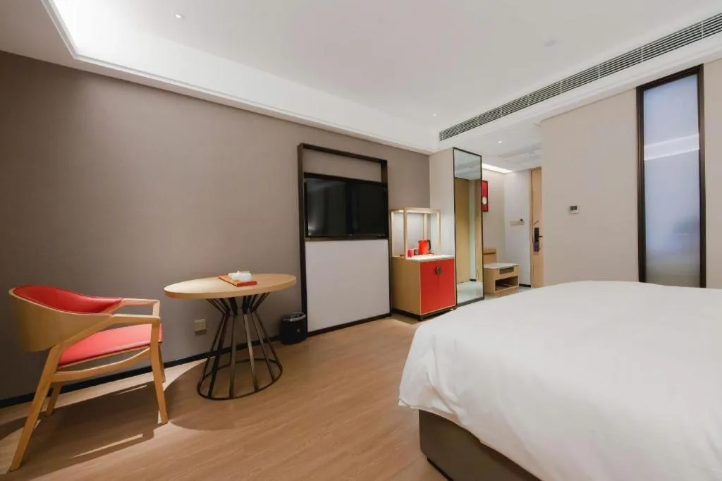 Bed in Echeng Hotel Hezhou Shizheng Square