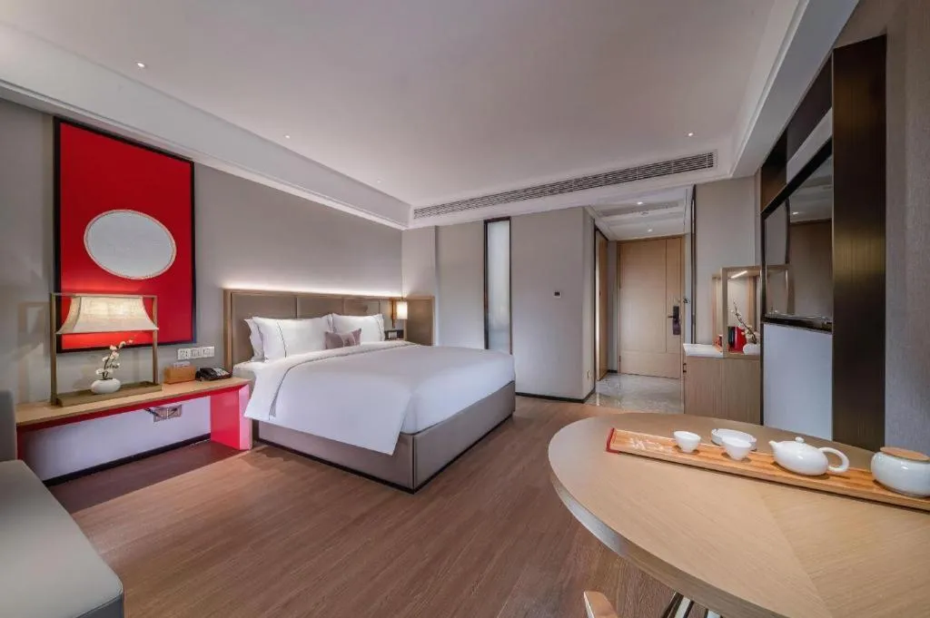 Bed in Echeng Hotel Hezhou Shizheng Square