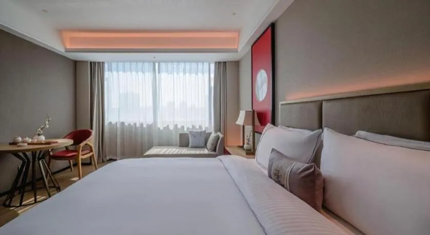 Bed in Echeng Hotel Hezhou Shizheng Square