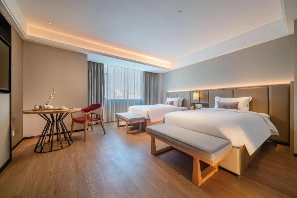 Bed in Echeng Hotel Hezhou Shizheng Square