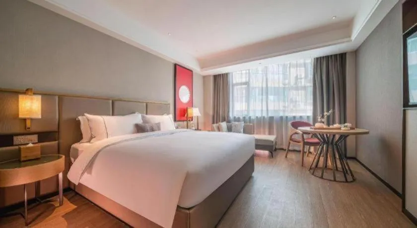 Bed in Echeng Hotel Hezhou Shizheng Square