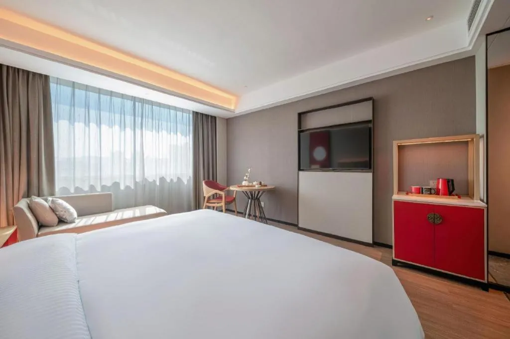 Bed in Echeng Hotel Hezhou Shizheng Square