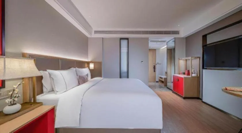 Bed in Echeng Hotel Hezhou Shizheng Square