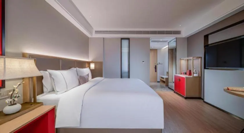 Bed in Echeng Hotel Hezhou Shizheng Square