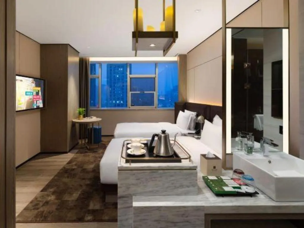 Bed in Echarm Plus Hotel Hangzhou Binjiang Xingguang Avenue