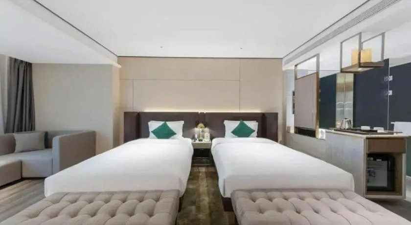 Bed in Echarm Plus Hotel Hangzhou Binjiang Xingguang Avenue