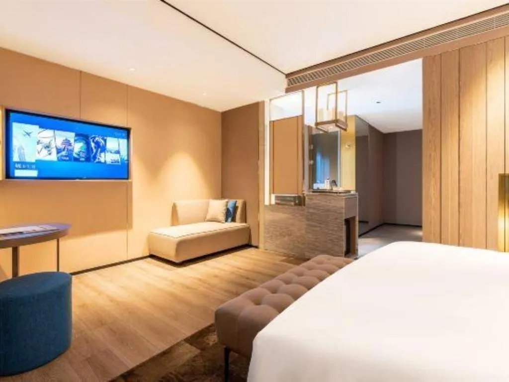 Bed in Echarm Plus Hotel Hangzhou Binjiang Xingguang Avenue