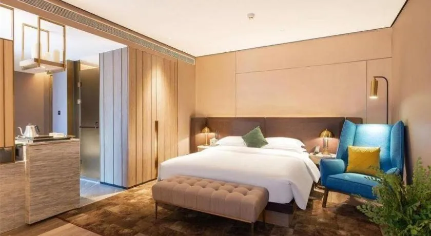 Bed in Echarm Plus Hotel Hangzhou Binjiang Xingguang Avenue
