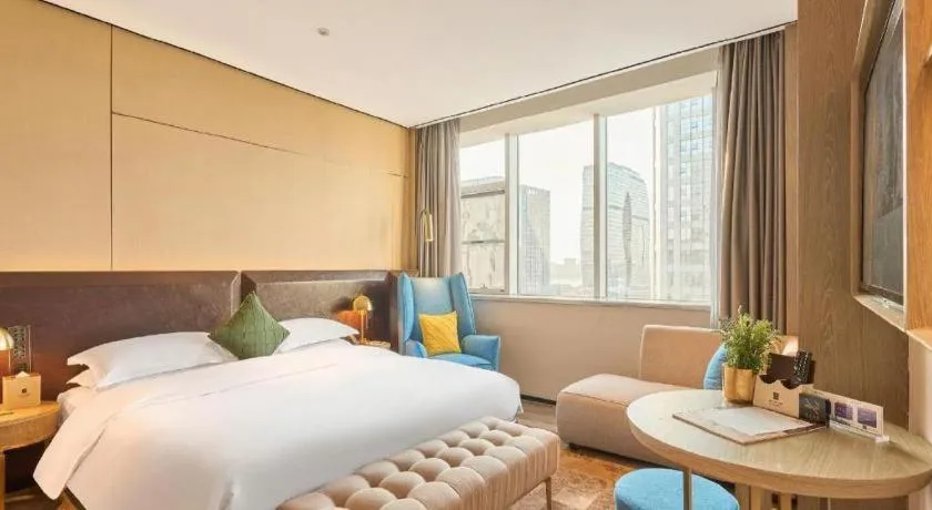 Bed in Echarm Plus Hotel Hangzhou Binjiang Xingguang Avenue