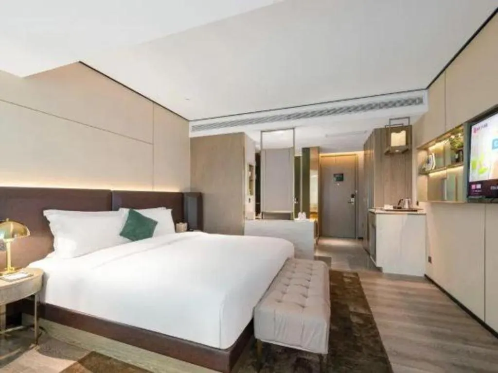 Bed in Echarm Plus Hotel Hangzhou Binjiang Xingguang Avenue
