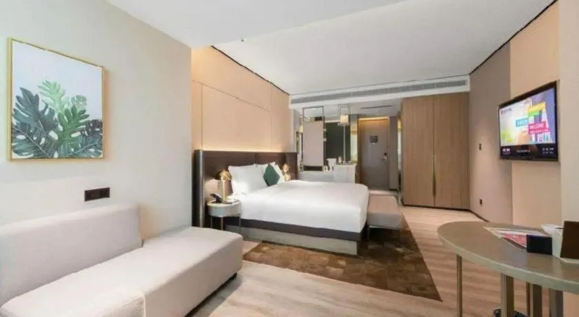 Bed in Echarm Plus Hotel Hangzhou Binjiang Xingguang Avenue