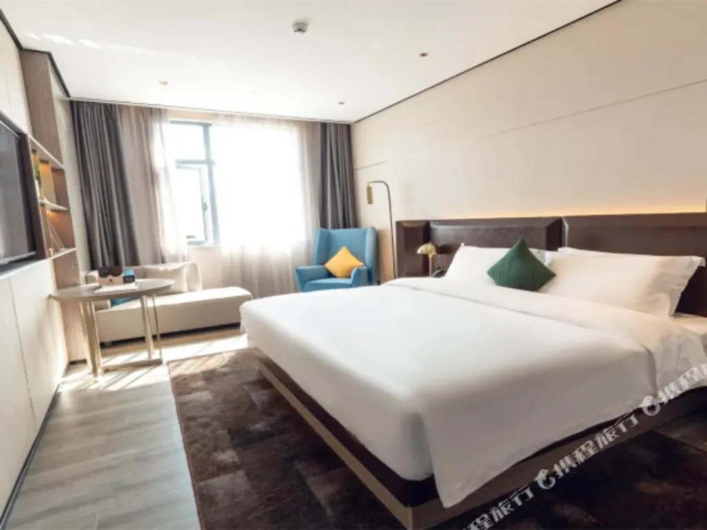 Bed in Echarm Plus Hotel Hangzhou Binjiang Xingguang Avenue