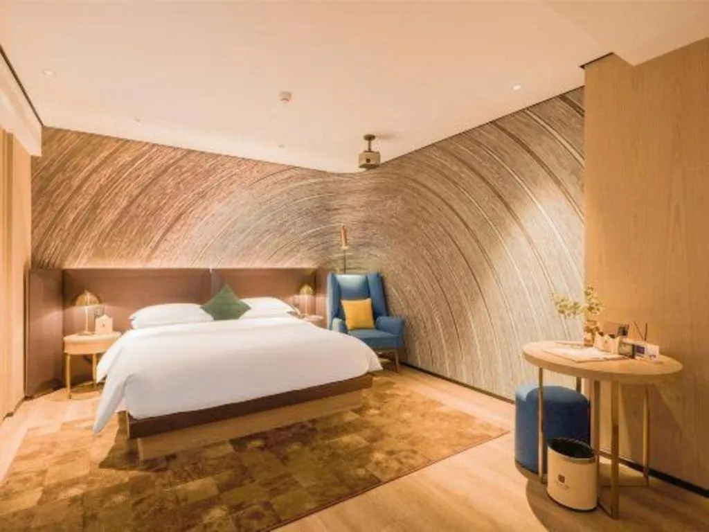 Bed in Echarm Plus Hotel Hangzhou Binjiang Xingguang Avenue