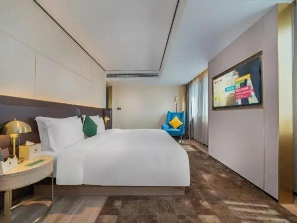 Bed in Echarm Plus Hotel Hangzhou Binjiang Xingguang Avenue