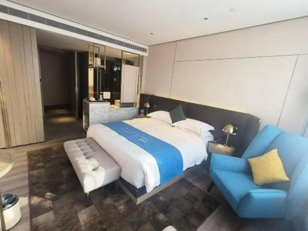 Bed in Echarm Plus Hotel Hangzhou Binjiang Xingguang Avenue