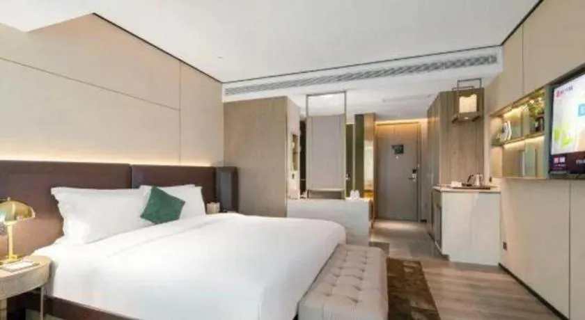 Bed in Echarm Plus Hotel Hangzhou Binjiang Xingguang Avenue