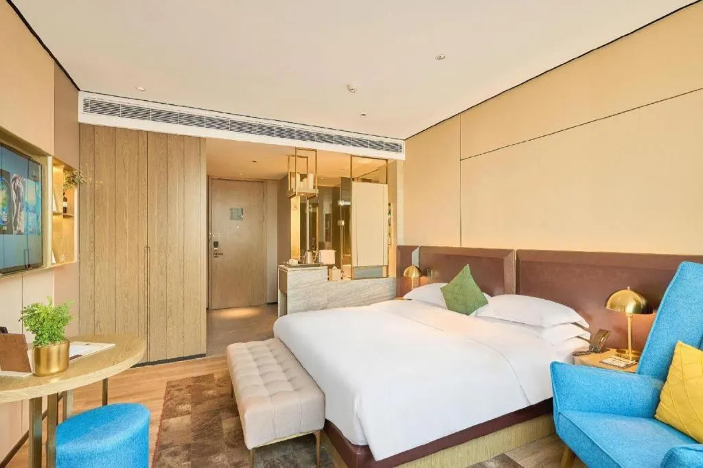 Bed in Echarm Plus Hotel Hangzhou Binjiang Xingguang Avenue