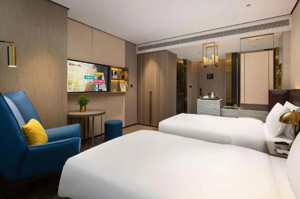 Bed in Echarm Plus Hotel Hangzhou Binjiang Xingguang Avenue