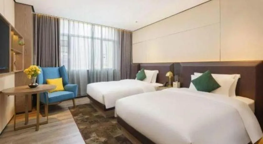 Bed in Echarm Plus Hotel Hangzhou Binjiang Xingguang Avenue