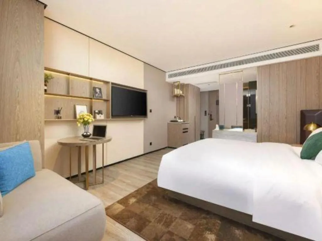 Bed in Echarm Plus Hotel Hangzhou Binjiang Xingguang Avenue