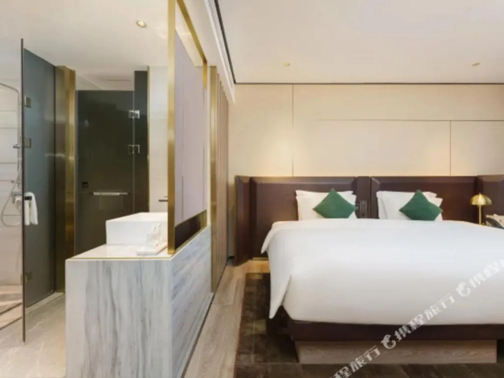 Bed in Echarm Plus Hotel Hangzhou Binjiang Xingguang Avenue