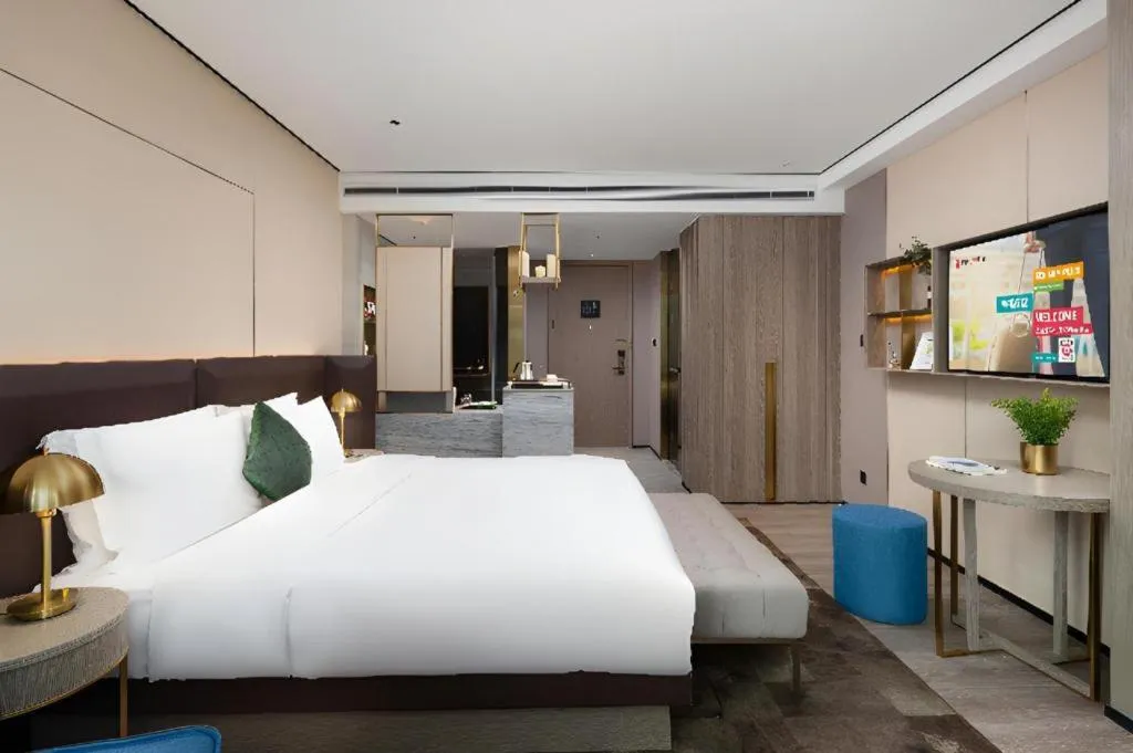 Bed in Echarm Plus Hotel Hangzhou Binjiang Xingguang Avenue