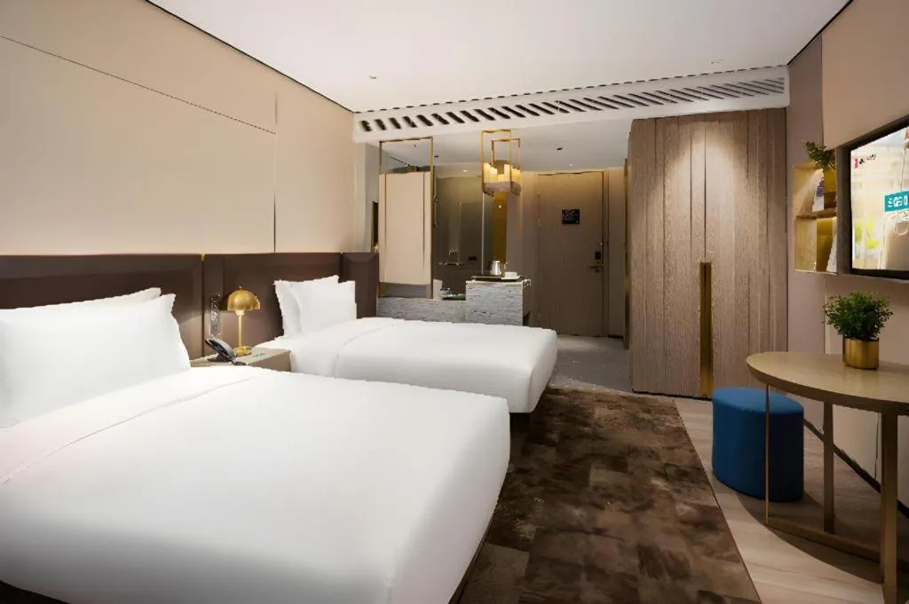 Bed in Echarm Plus Hotel Hangzhou Binjiang Xingguang Avenue