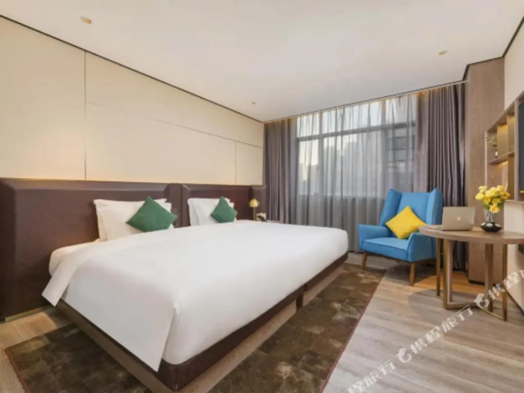 Bed in Echarm Plus Hotel Hangzhou Binjiang Xingguang Avenue