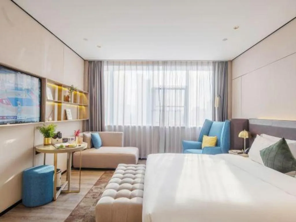 Bed in Echarm Plus Hotel Hangzhou Binjiang Xingguang Avenue