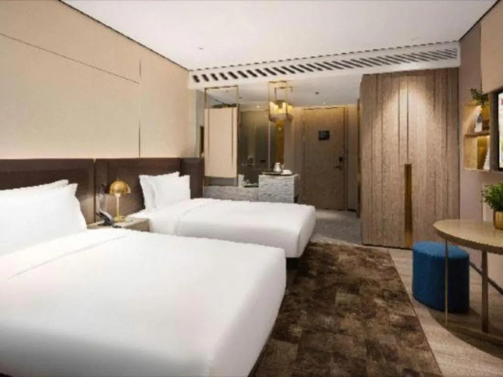 Bed in Echarm Plus Hotel Hangzhou Binjiang Xingguang Avenue