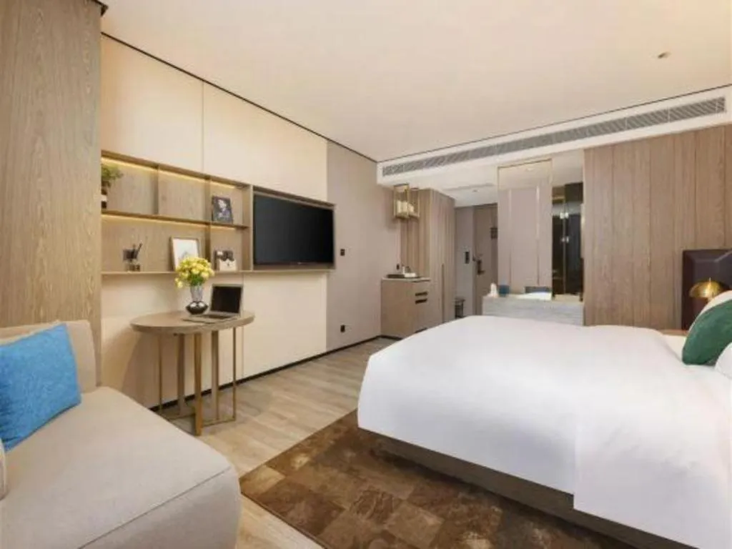 Bed in Echarm Plus Hotel Hangzhou Binjiang Xingguang Avenue