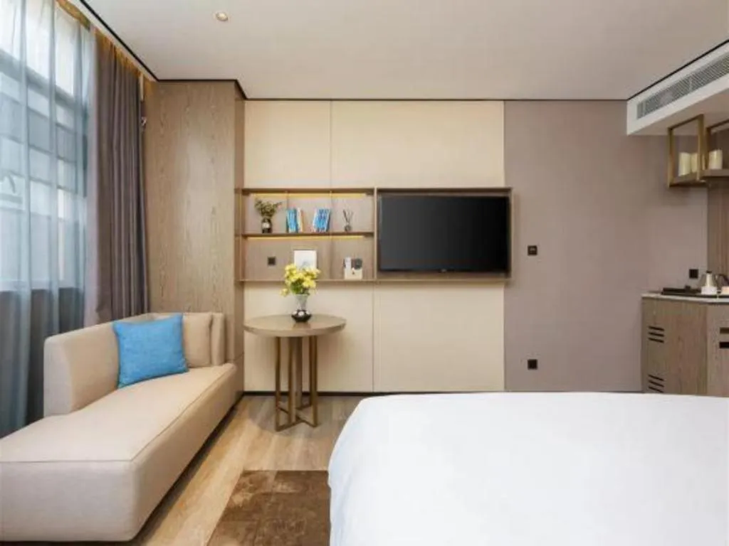 Bed in Echarm Plus Hotel Hangzhou Binjiang Xingguang Avenue