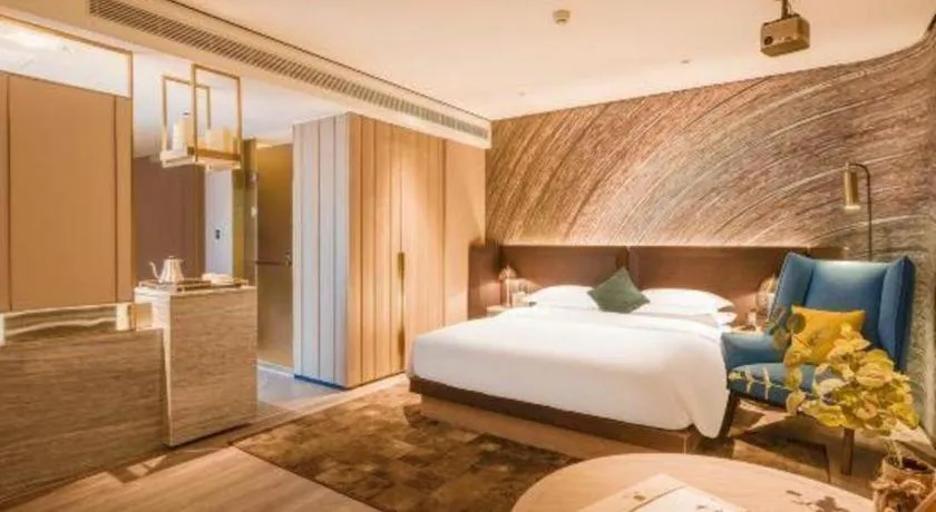 Bed in Echarm Plus Hotel Hangzhou Binjiang Xingguang Avenue
