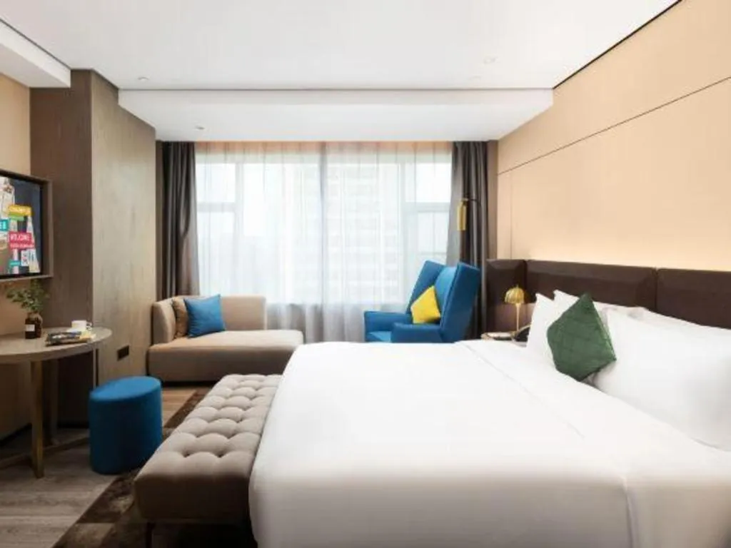 Bed in Echarm Plus Hotel Hangzhou Binjiang Xingguang Avenue