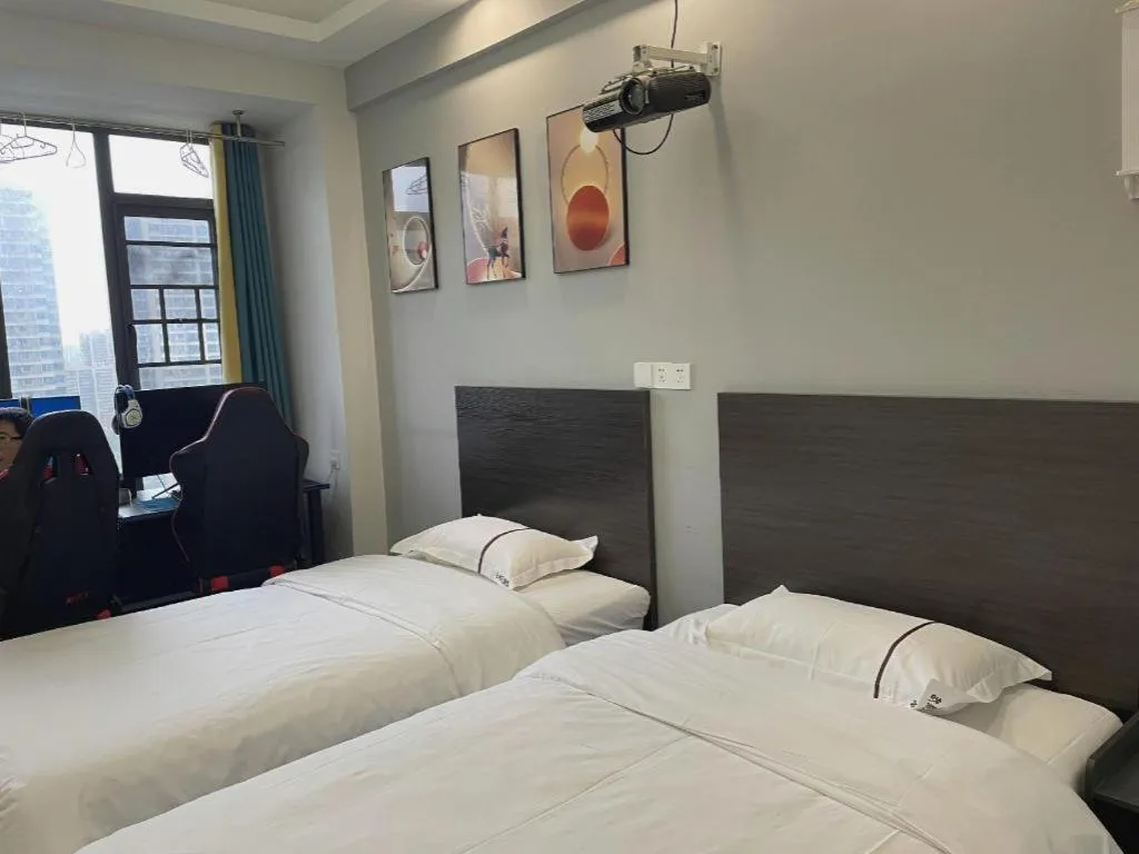 Bed in Echarm Hotel Changsha South High-Speed Railway Station Wuyue Plaza