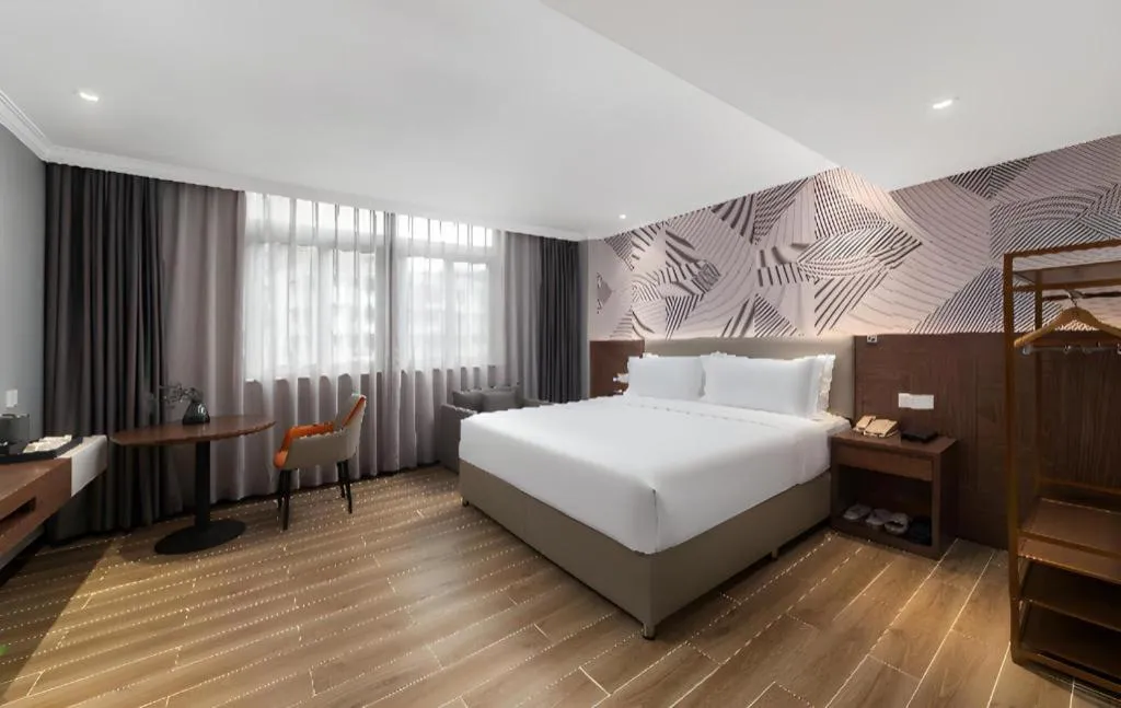 Bed in Borrman Hotel Chongqing Hechuan High-speed Railway Station District Government