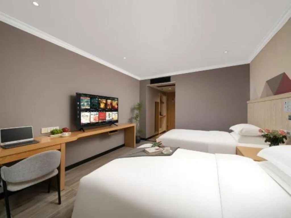 Bed in Borrman Hotel Chongqing Hechuan High-speed Railway Station District Government
