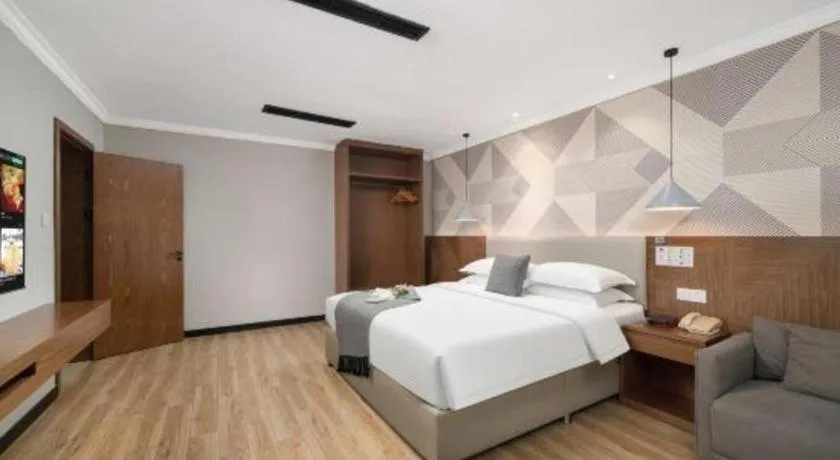 Bed in Borrman Hotel Chongqing Hechuan High-speed Railway Station District Government